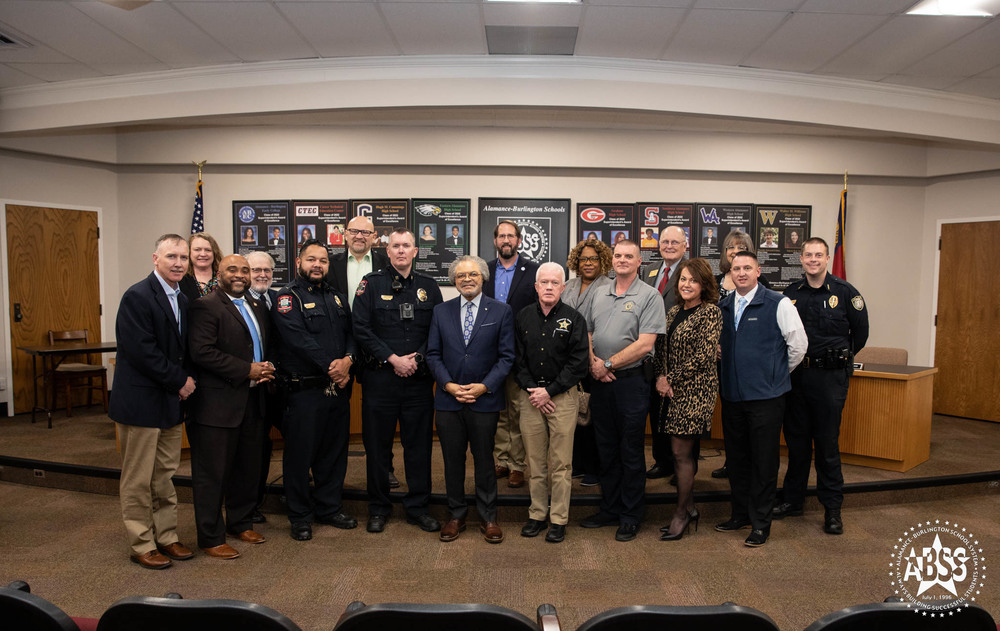 Judge Brown, ACC President, ABSS Board, and other law enforcement partners pose for photo after signing MOU to help ABSS at risk youth. 