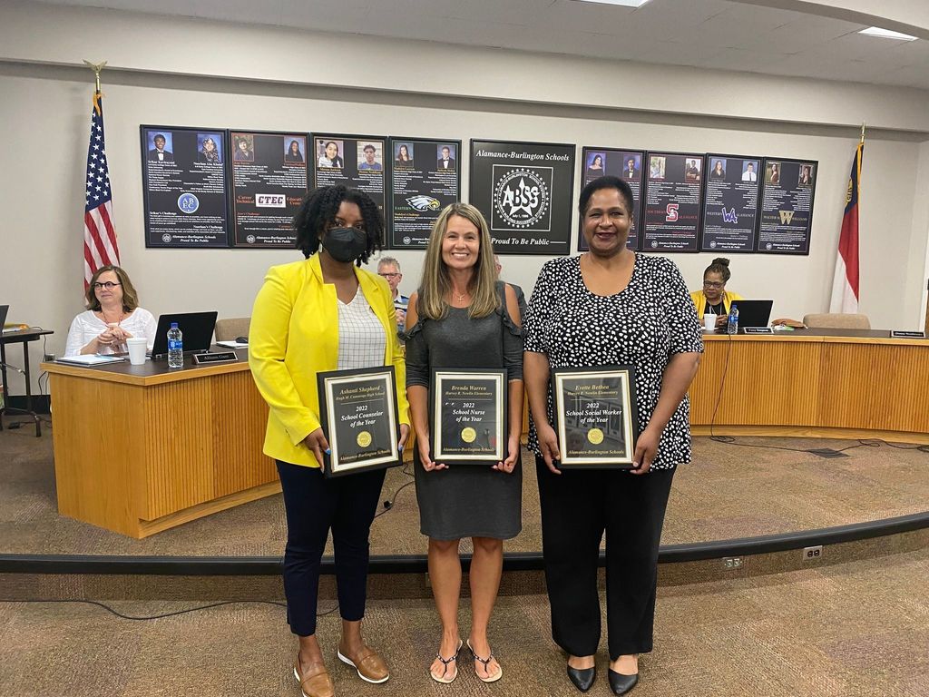  '22 Counselor of the Year, Ashanti Shepherd , '22 Social Worker of the Year, Evette Bethea , '22 School Nurse of the Year, Brenda Warren all holding their awards