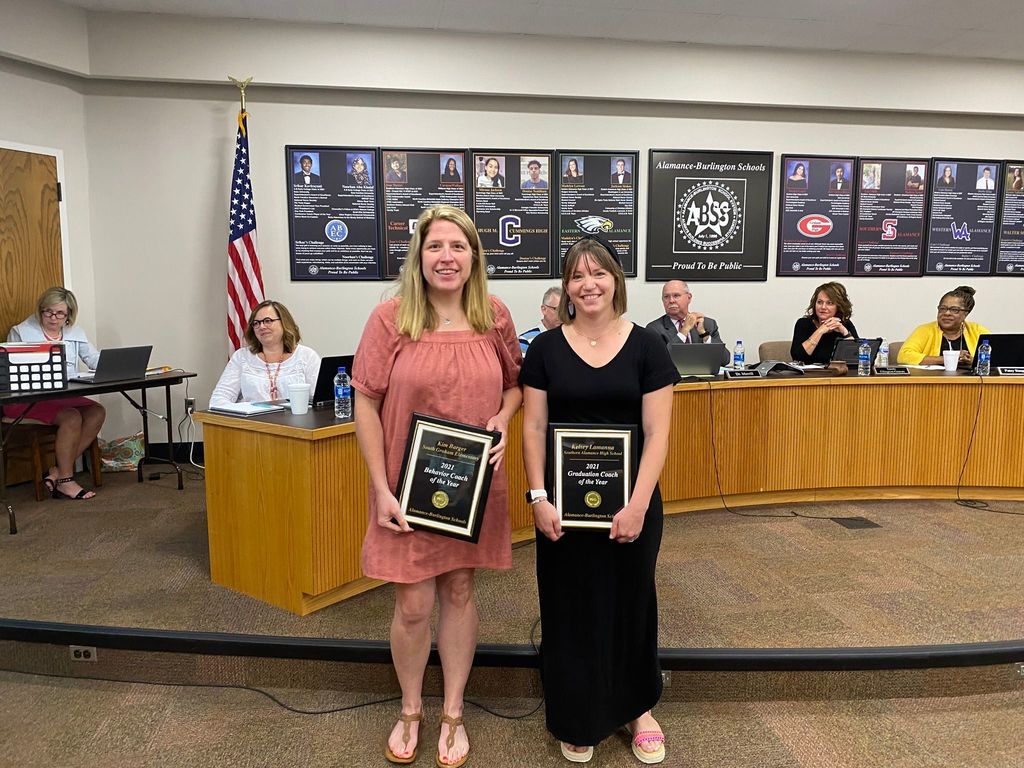 '21 Behavior Coach of the Year, Kim Barger and '21 Graduation Coach of the Year, Kelsey Lamanna holding their awards