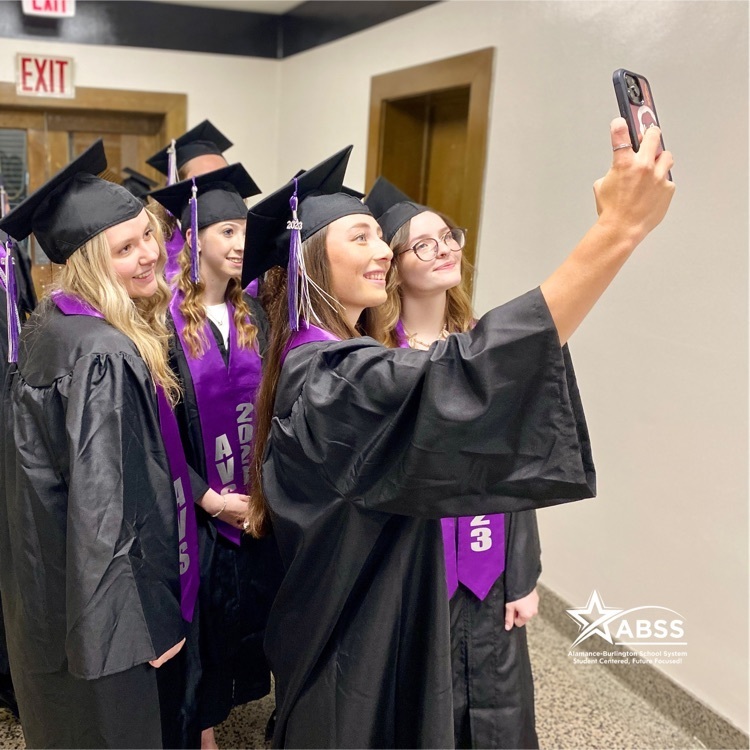 Seniors from Alamance Virtual School take a selfie in the hallway