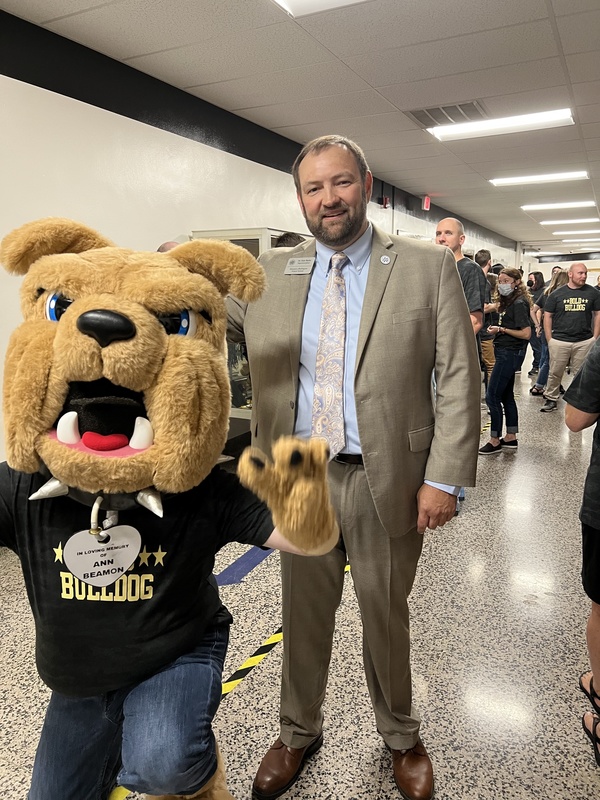 Dr. Butler with the Walter Williams High School bulldog mascot