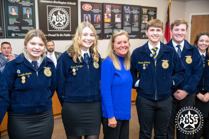 Principal Teresa Faucette posing with Southern Alamance FFA students 