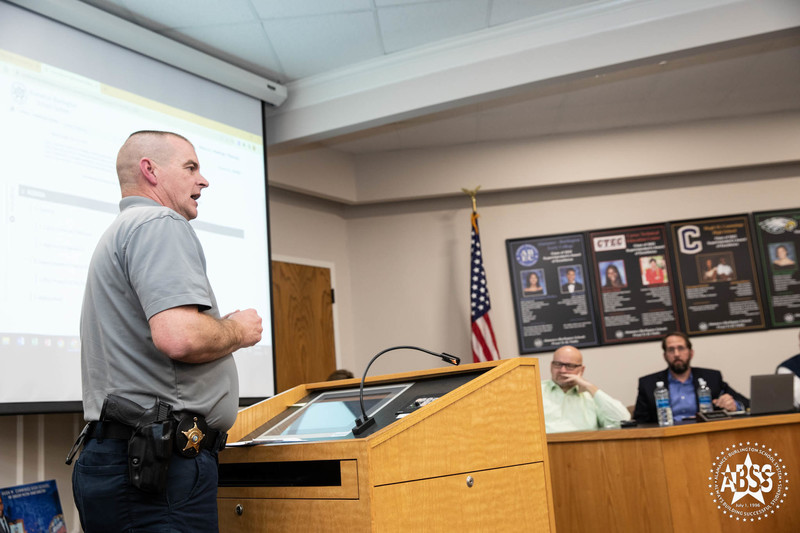 Brandon Mays with Alamance Sheriff's Office speaking to ABSS Board of Education